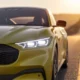 2026 Ford Mustang Mach-E Select RWD white color on desert highway hero shot