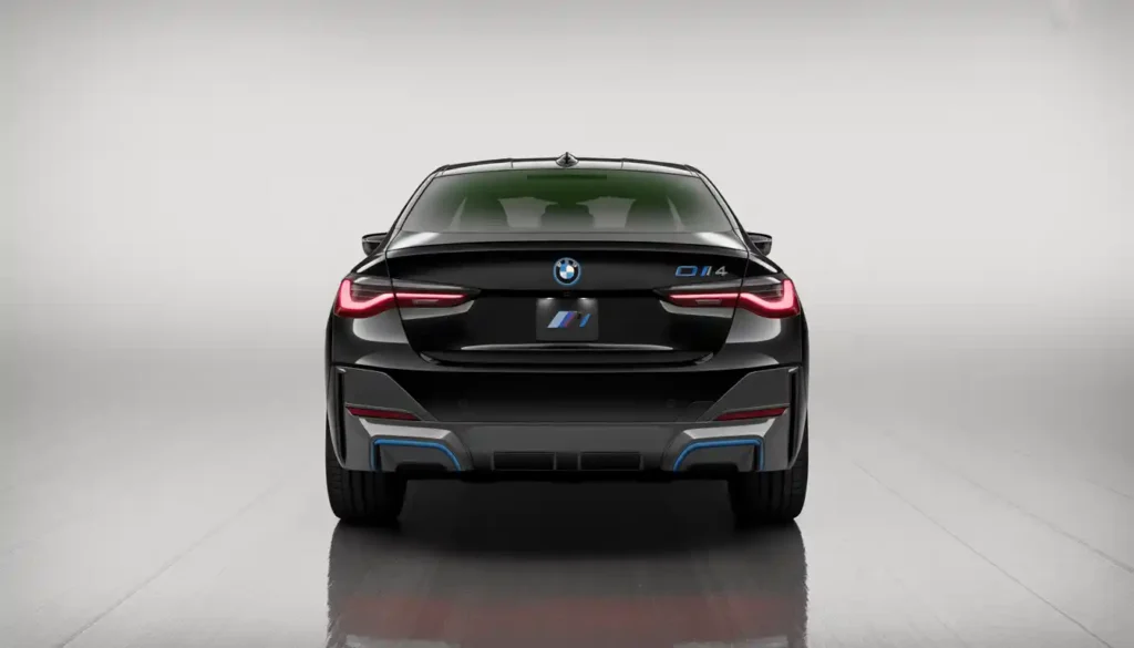 2026 BMW i4 eDrive40 rear three-quarter view showing hatchback design and LED taillights