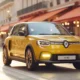Renault 5 E-Tech 2026 in Pop Yellow parked on European city street at golden hour