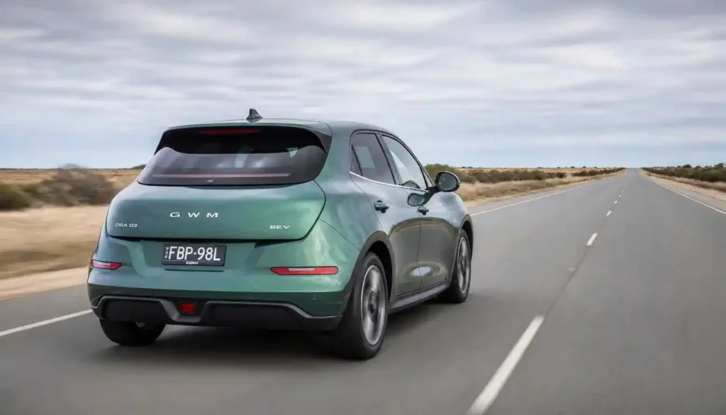 2026 GWM Ora Funky Cat electric car driving on an open motorway showing its long-distance range.