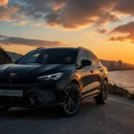 A black CUPRA Terramar 2026 parked on a cliff edge with the sun setting behind it.